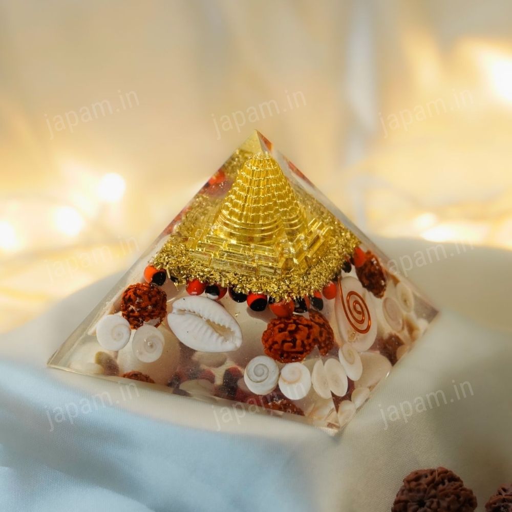 Golden Lakshmi Money Magnet Pyramid with Rudraksha, Shree Yantra, Gomti Chakra & White Kaudi